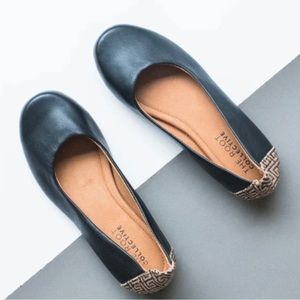 The Root Collective Gaby flat in black leather